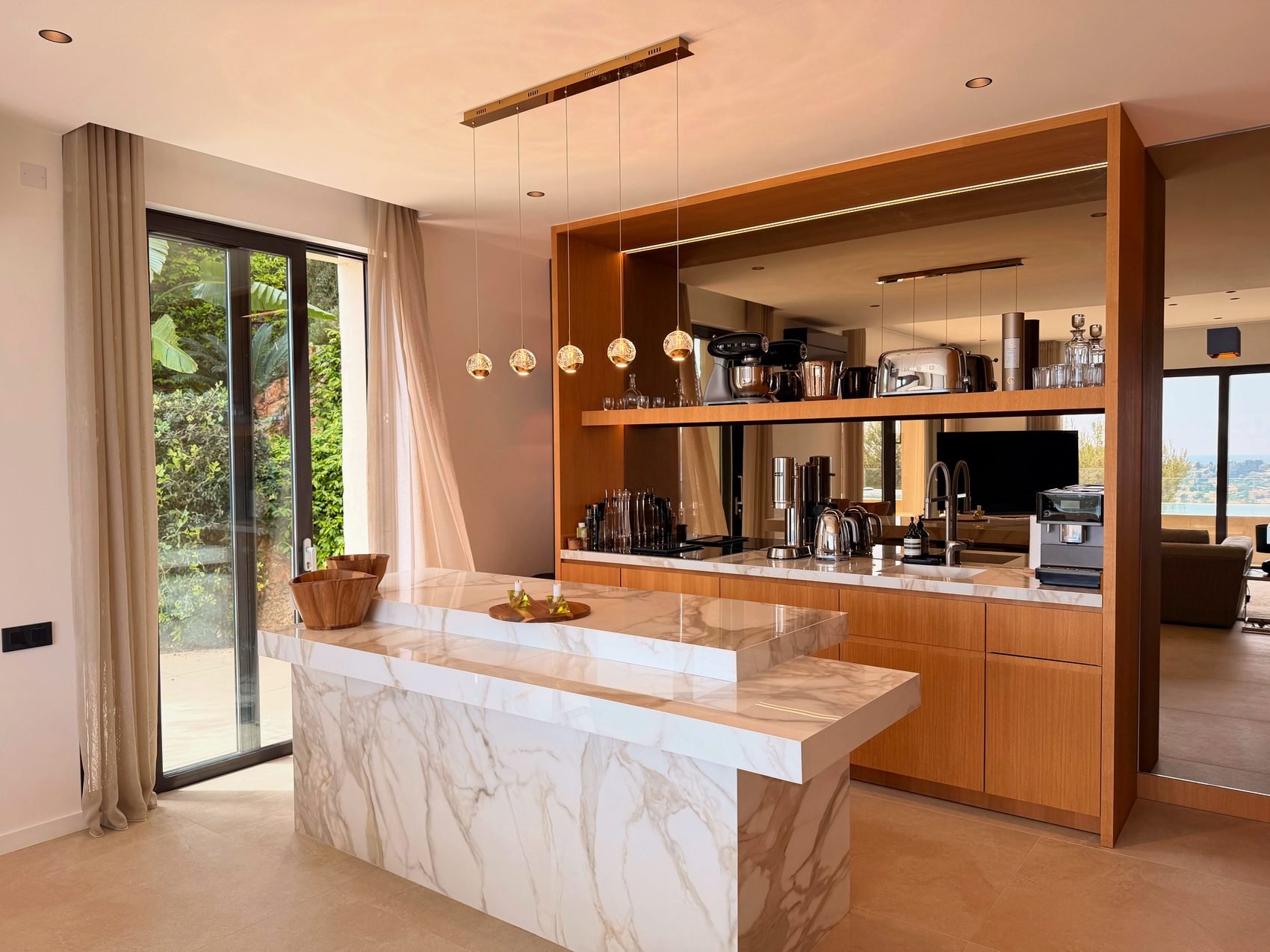 Open kitchen with a large island and breakfast bar